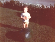 Why my mother loved to contrast me with large objects as a child is still a mystery to me. I also have a shot of me as an infant with a slice of ham covering me like a blanket. Big baby, big object...