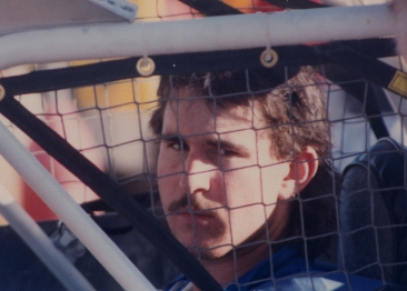 Mom showed me what depth of field was on that first outing with the Rollei - she looked at shots with that in mind. Ron through the cage of the race car. Her little boy all grown up.